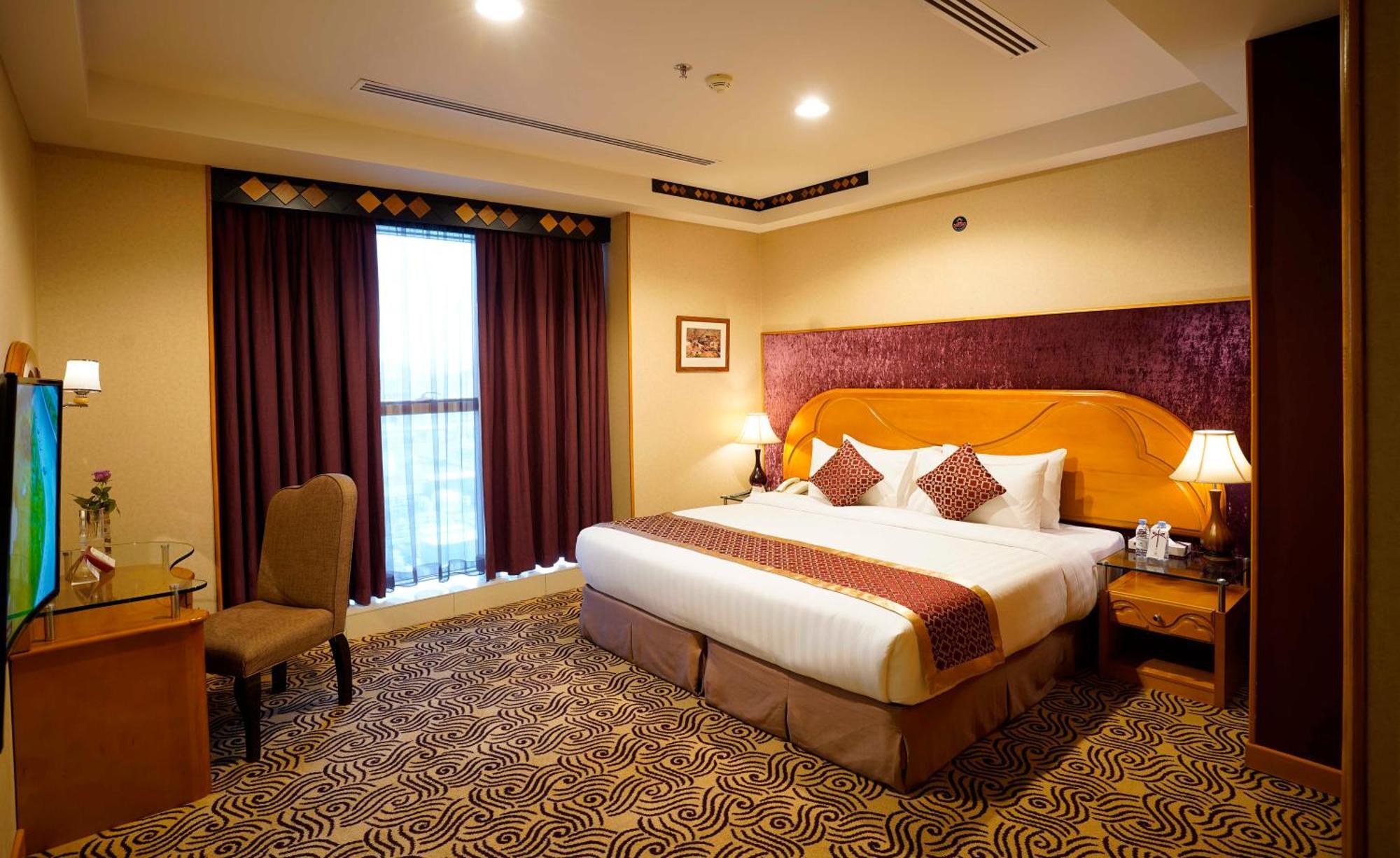 Awaliv International Hotel Táif Pokoj fotografie A bedroom at the hotel